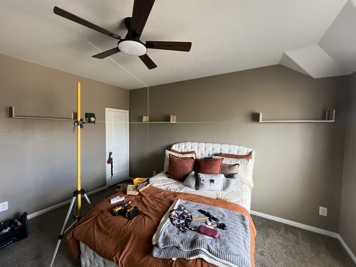 Ceiling fan and floating shelves installed level, Katy TX